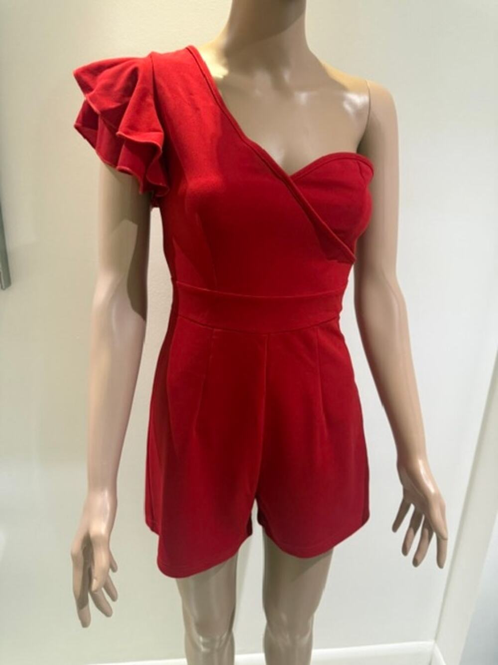 Red one-shoulder ruffle romper